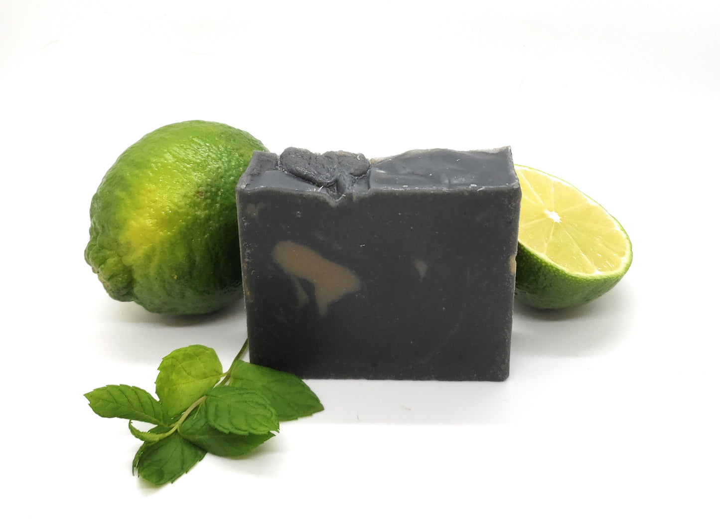 Wildfire Aromatics Activated charcoal goat's milk soap with an essential oil blend of tea tree, lime, and peppermint for acne, detox.